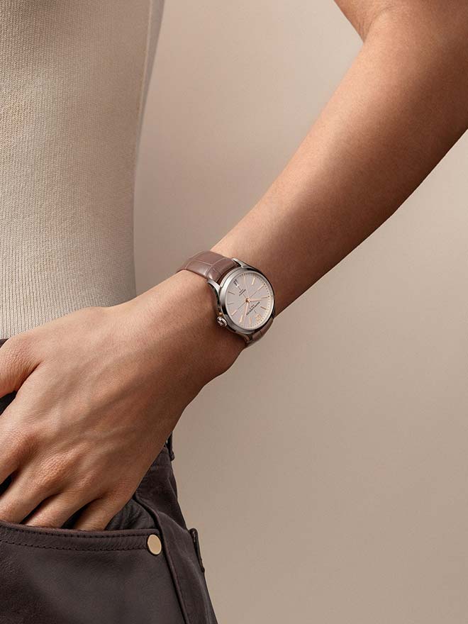 Baume & Mercier Clifton Baumatic on a woman's wrist 