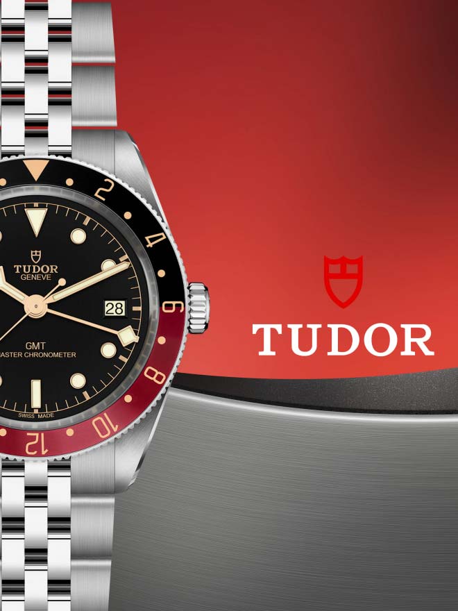 TUDOR Black Bay against a red and grey background