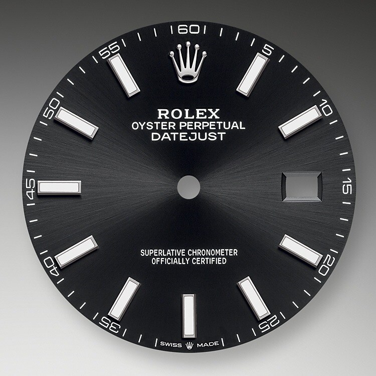 The dial is the distinctive face of a Rolex watch, the feature most responsible for its identity and readability. Characterised by hour markers fashioned from gold to prevent tarnishing, every Rolex dial is designed and manufactured in-house, largely by hand to ensure perfection.