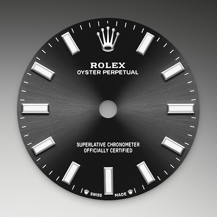 The sunray finish creates delicate light reflections on many dials in the Oyster Perpetual collection. It is obtained using masterful brushing techniques that create grooves running outwards from the centre of the dial. Light is diffused consistently along each engraving, creating a characteristic subtle glow that moves depending on the position of the wrist. Once the sunray finish has been completed, the dial colour is applied using Physical Vapour Deposition or electroplating. A light coat of varnish gives the dial its final look.