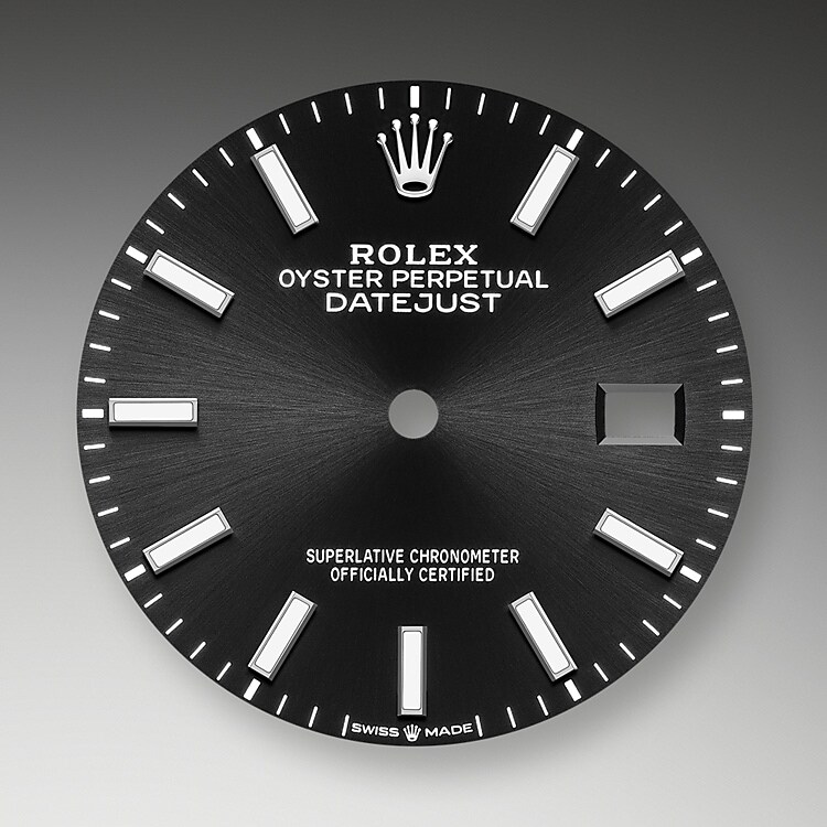 The sunray finish creates delicate light reflections on many dials in the Oyster Perpetual collection. It is obtained using masterful brushing techniques that create grooves running outwards from the centre of the dial. Light is diffused consistently along each engraving, creating a characteristic subtle glow that moves depending on the position of the wrist. Once the sunray finish has been completed, the dial colour is applied using Physical Vapour Deposition or electroplating. A light coat of varnish gives the dial its final look.