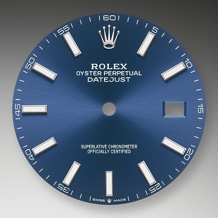 The sunray finish creates delicate light reflections on many dials in the Oyster Perpetual collection. It is obtained using masterful brushing techniques that create grooves running outwards from the center of the dial. Light is diffused consistently along each engraving, creating a characteristic subtle glow that moves depending on the position of the wrist. Once the sunray finish has been completed, the dial color is applied using Physical Vapour Deposition or electroplating. A light coat of varnish gives the dial its final look.