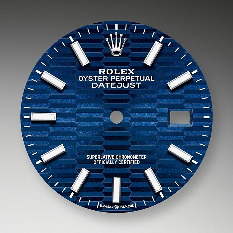 The dial is the distinctive face of a Rolex watch, the feature most responsible for its identity and readability. Characterised by hour markers fashioned from gold to prevent tarnishing, every Rolex dial is designed and manufactured in-house, largely by hand to ensure perfection.