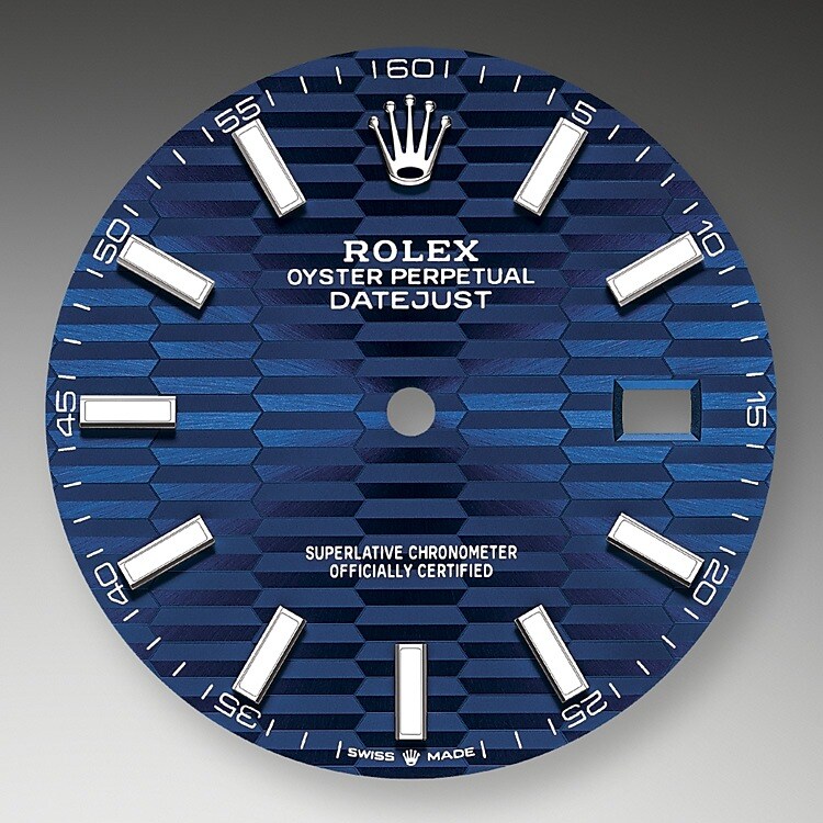 The dial is the distinctive face of a Rolex watch, the feature most responsible for its identity and readability. Characterised by hour markers fashioned from gold to prevent tarnishing, every Rolex dial is designed and manufactured in-house, largely by hand to ensure perfection.