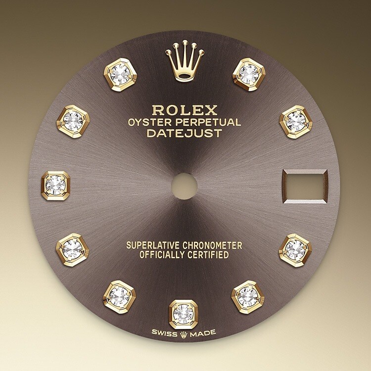 This dial features diamonds in 18 ct gold settings. The sunray finish creates delicate light reflections on many dials in the Oyster Perpetual collection. It is obtained using masterful brushing techniques that create grooves running outwards from the centre of the dial. Light is diffused consistently along each engraving, creating a characteristic subtle glow that moves depending on the position of the wrist. Once the sunray finish has been completed, the dial colour is applied using Physical Vapour Deposition or electroplating. A light coat of varnish gives the dial its final look.