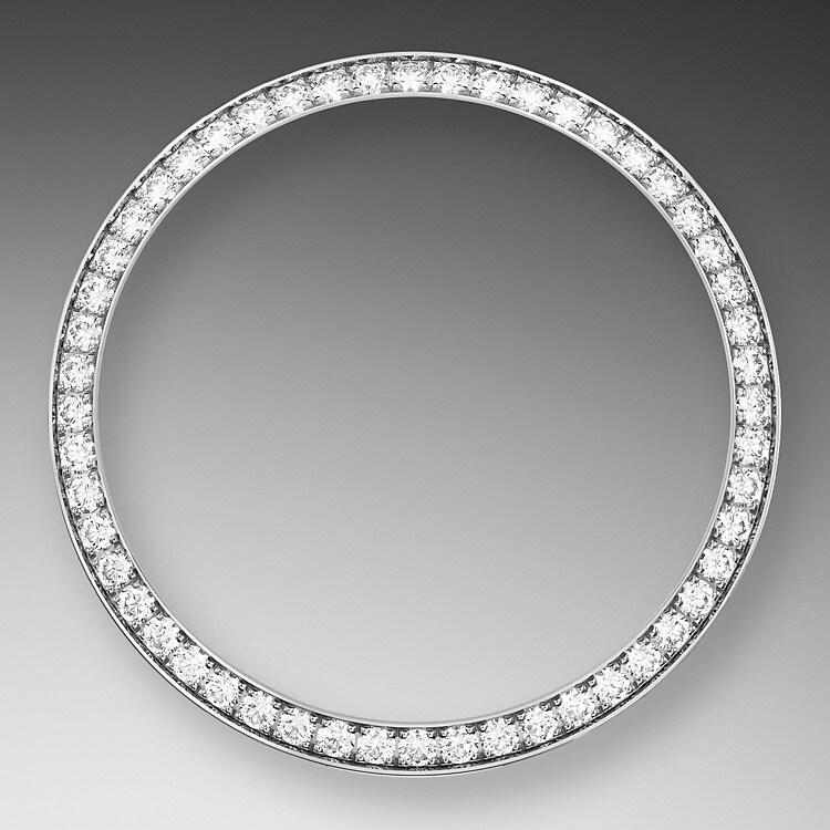 Gem-setters, like sculptors, finely carve the precious metal to hand-shape the seat in which each gemstone will be perfectly lodged. With the art and craft of a jeweller, the stone is placed and meticulously aligned with the others, then firmly secured in its gold or platinum setting. Besides the intrinsic quality of the stones, several other criteria contribute to the beauty of Rolex gem-setting: the precise alignment of the height of the gems, their orientation and position, the regularity, strength and proportions of the setting as well as the intricate finishing of the metalwork. A sparkling symphony to enhance the watch and enchant the wearer.