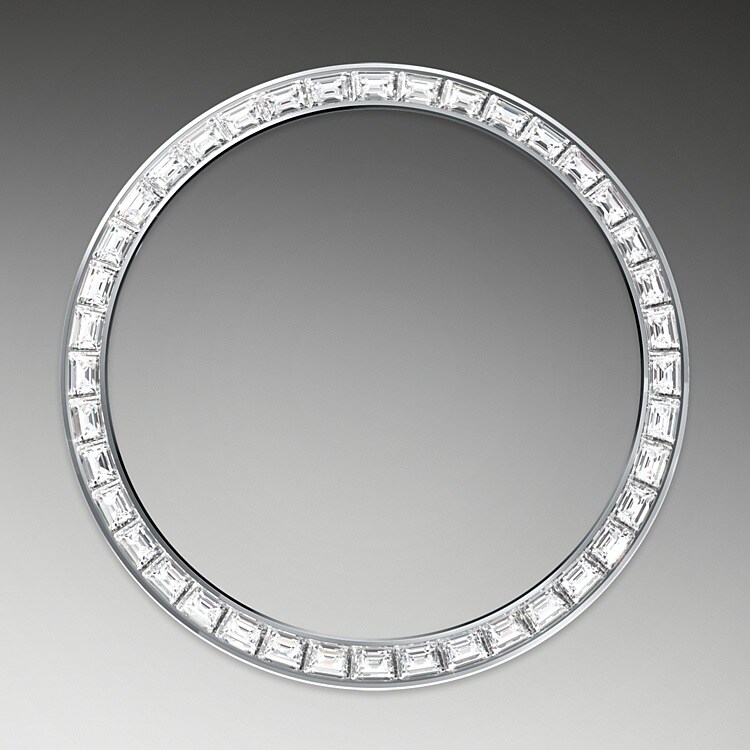 Gem-setters, like sculptors, finely carve the precious metal to hand-shape the seat in which each gemstone will be perfectly lodged. With the art and craft of a jeweller, the stone is placed and meticulously aligned with the others, then firmly secured in its gold or platinum setting. Besides the intrinsic quality of the stones, several other criteria contribute to the beauty of Rolex gem-setting: the precise alignment of the height of the gems, their orientation and position, the regularity, strength and proportions of the setting as well as the intricate finishing of the metalwork. A sparkling symphony to enhance the watch and enchant the wearer.