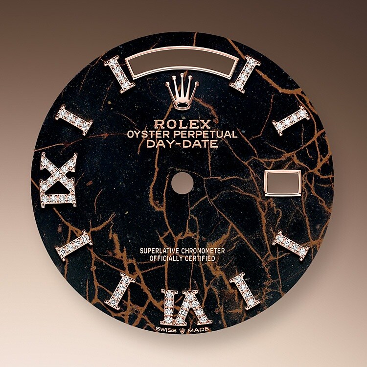 The dial is the distinctive face of a Rolex watch, the feature most responsible for its identity and readability. Characterised by hour markers fashioned from gold to prevent tarnishing, every Rolex dial is designed and manufactured in-house, largely by hand to ensure perfection.