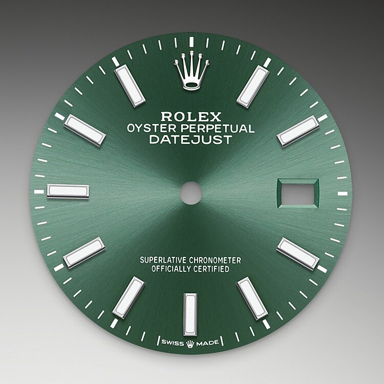 The sunray finish creates delicate light reflections on many dials in the Oyster Perpetual collection. It is obtained using masterful brushing techniques that create grooves running outwards from the centre of the dial. Light is diffused consistently along each engraving, creating a characteristic subtle glow that moves depending on the position of the wrist. Once the sunray finish has been completed, the dial colour is applied using Physical Vapour Deposition or electroplating. A light coat of varnish gives the dial its final look.