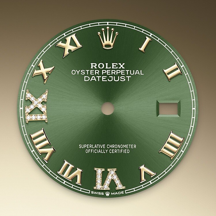 This dial features a Roman VI and IX in 18 ct gold, set with 24 diamonds. The sunray finish creates delicate light reflections on many dials in the Oyster Perpetual collection. It is obtained using masterful brushing techniques that create grooves running outwards from the centre of the dial. Light is diffused consistently along each engraving, creating a characteristic subtle glow that moves depending on the position of the wrist. Once the sunray finish has been completed, the dial colour is applied using Physical Vapour Deposition or electroplating. A light coat of varnish gives the dial its final look.