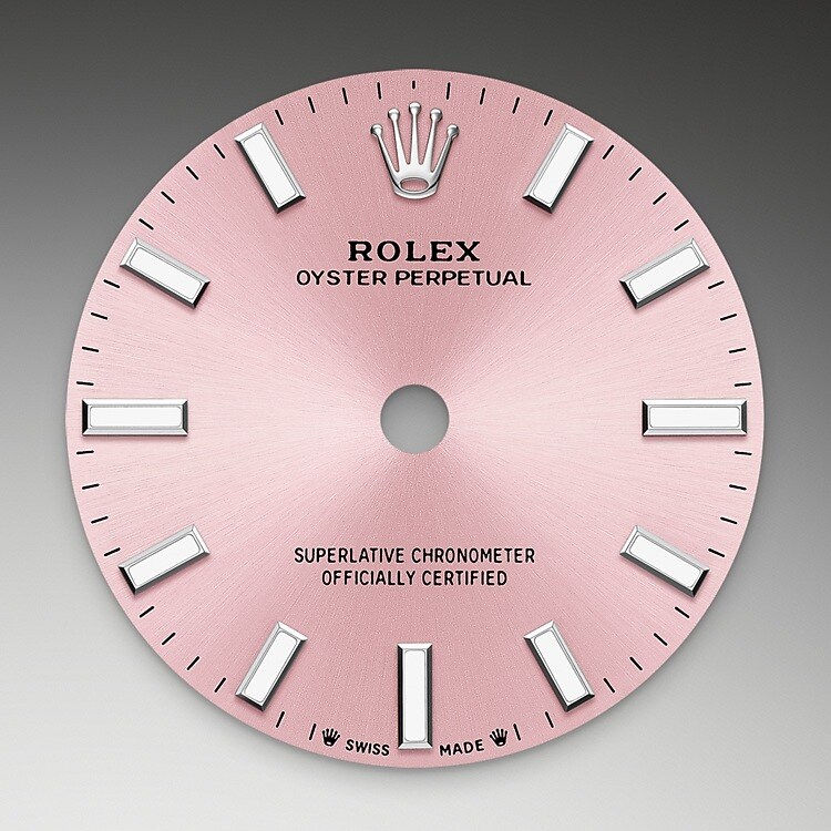 The sunray finish creates delicate light reflections on many dials in the Oyster Perpetual collection. It is obtained using masterful brushing techniques that create grooves running outwards from the centre of the dial. Light is diffused consistently along each engraving, creating a characteristic subtle glow that moves depending on the position of the wrist. Once the sunray finish has been completed, the dial colour is applied using Physical Vapour Deposition or electroplating. A light coat of varnish gives the dial its final look.