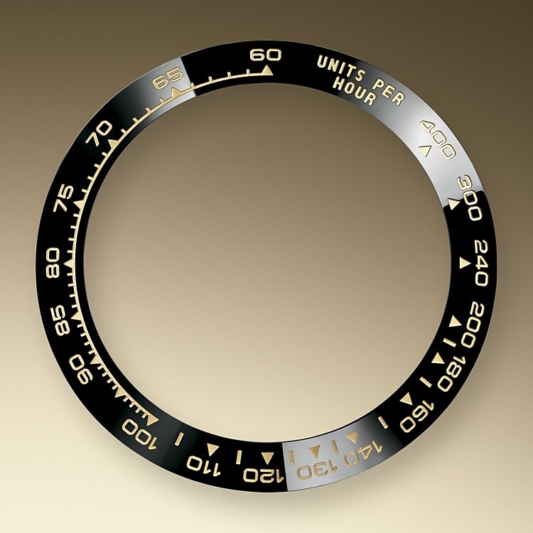 A key part of the model’s identity is the bezel moulded with a tachymetric scale for measuring average speeds of up to 400 miles or kilometres per hour. Blending high technology with sleek aesthetics, the black bezel is reminiscent of the 1965 model that was fitted with a black Plexiglas bezel insert. </p> The monobloc Cerachrom bezel in high-tech ceramic offers a number of advantages: it is corrosion resistant, virtually scratchproof and the colour is unaffected by UV rays. This extremely durable bezel also offers an exceptionally legible tachymetric scale, thanks to the deposition of a thin layer of platinum in the numerals and graduation via a PVD (Physical Vapour Deposition) process. The monobloc Cerachrom bezel is made in a single piece and holds the crystal firmly in place on the middle case, ensuring waterproofness.</p>