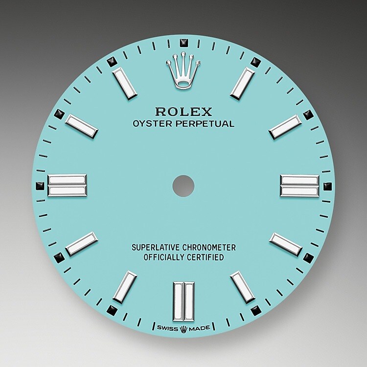 The dial is the distinctive face of a Rolex watch, the feature most responsible for its identity and readability. Characterised by hour markers fashioned from gold to prevent tarnishing, every Rolex dial is designed and manufactured in-house, largely by hand to ensure perfection.