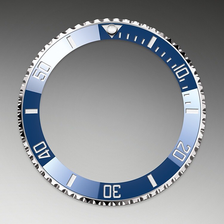 The Submariner's rotatable bezel is a key functionality of the watch. Its 60-minute graduations allow a diver to accurately and safely monitor diving time and decompression stops. Manufactured by Rolex from a hard, corrosion-resistant ceramic, the Cerachrom bezel insert is virtually scratchproof. A luminescent capsule on the zero marker ensures legibility, no matter how dark the environment. The bezel’s knurled edge is carefully designed to offer excellent grip under water, even with gloves.