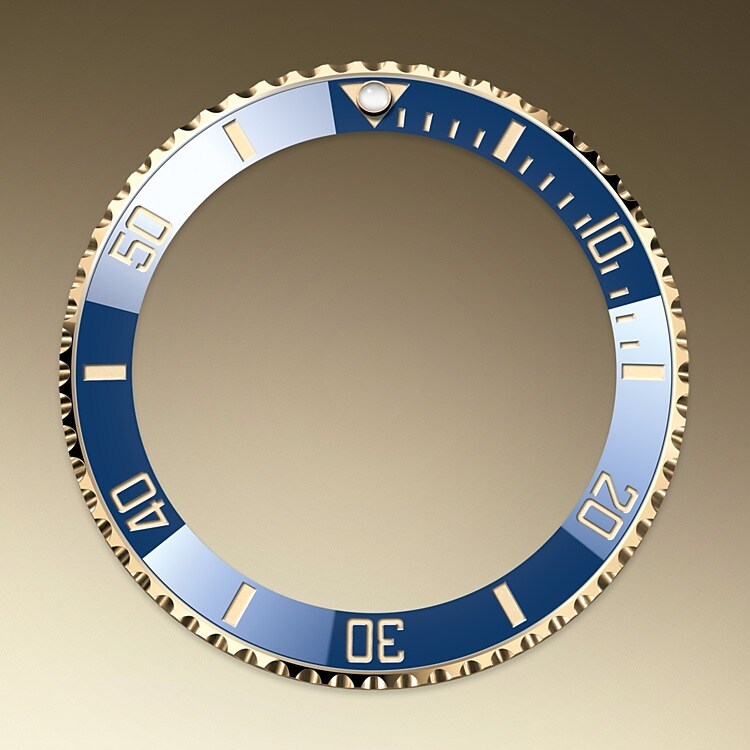 The Submariner's rotatable bezel is a key functionality of the watch. Its 60-minute graduations allow a diver to accurately and safely monitor diving time and decompression stops. Manufactured by Rolex from a hard, corrosion-resistant ceramic, the Cerachrom bezel insert is virtually scratchproof. A luminescent capsule on the zero marker ensures legibility, no matter how dark the environment. The bezel’s knurled edge is carefully designed to offer excellent grip under water, even with gloves.