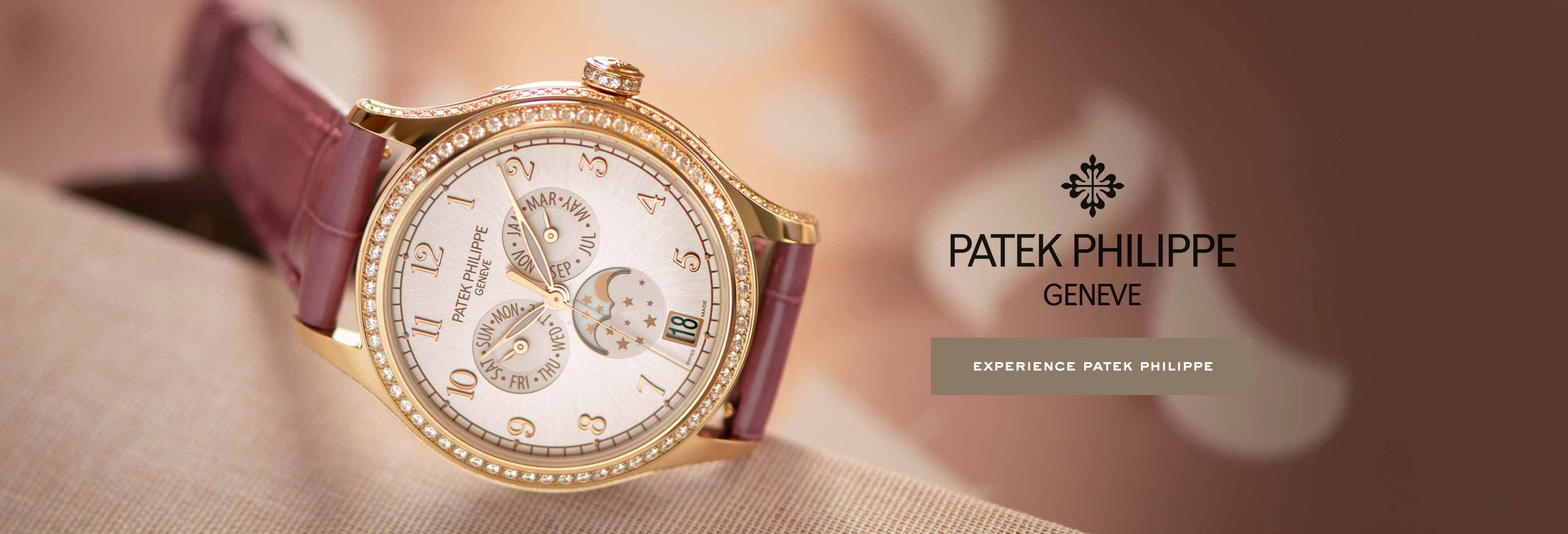 Patek Philippe Complication Ladies - 4947R lies on a woven, beige-colored surface