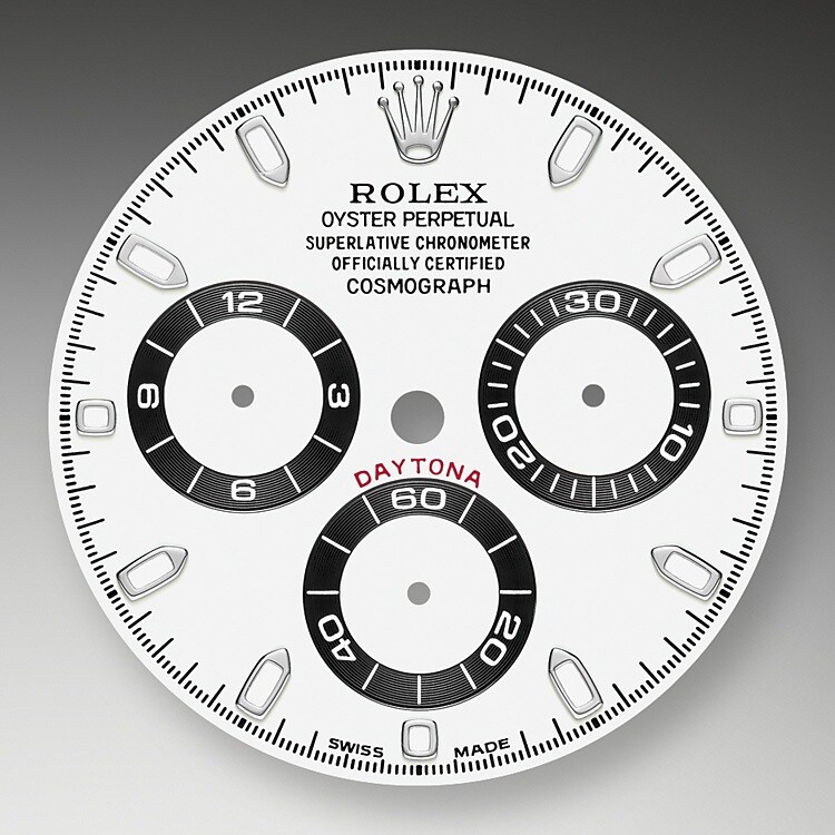 This model features a white dial with snailed counters, gold applique hour markers and hands with a Chromalight display, a highly-legible luminescent material. The central sweep seconds hand allows an accurate reading of 1/8 second, while the two counters on the dial display the lapsed time in hours and minutes. Drivers can accurately map out their track times and tactics without fail.